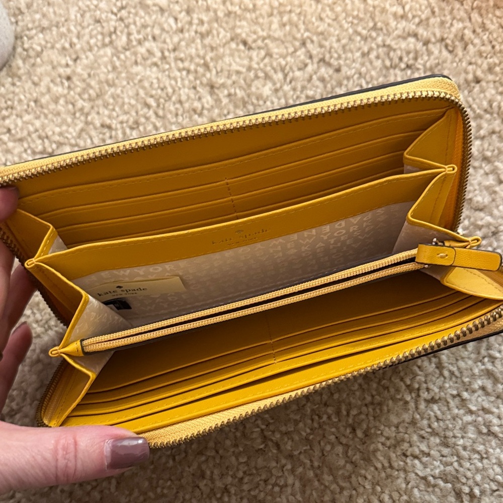 kate spade Embossed Logo Yellow Zip Wallet - Picture 2 of 3